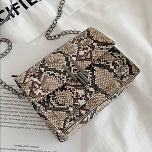 Snake skin chain crossbody bag